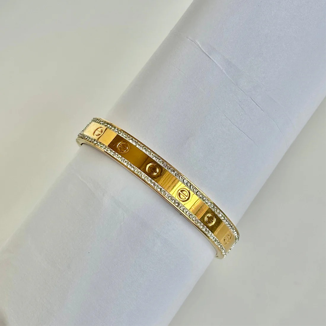 Elegant Cartier Love Bracelet in Yellow Gold with Diamond Accents